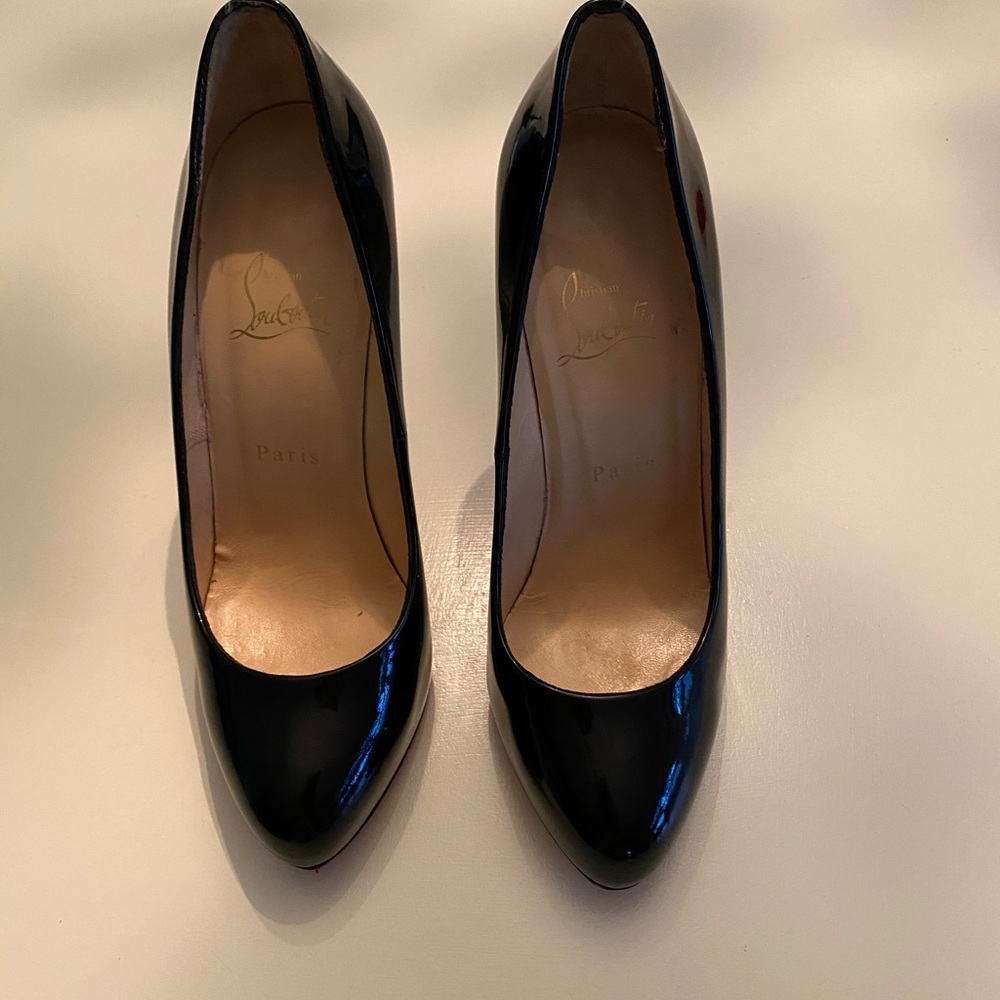 Christian Louboutin patent statement pump